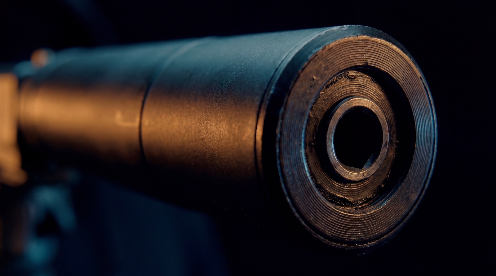 Extreme close-up of a suppressor barrel